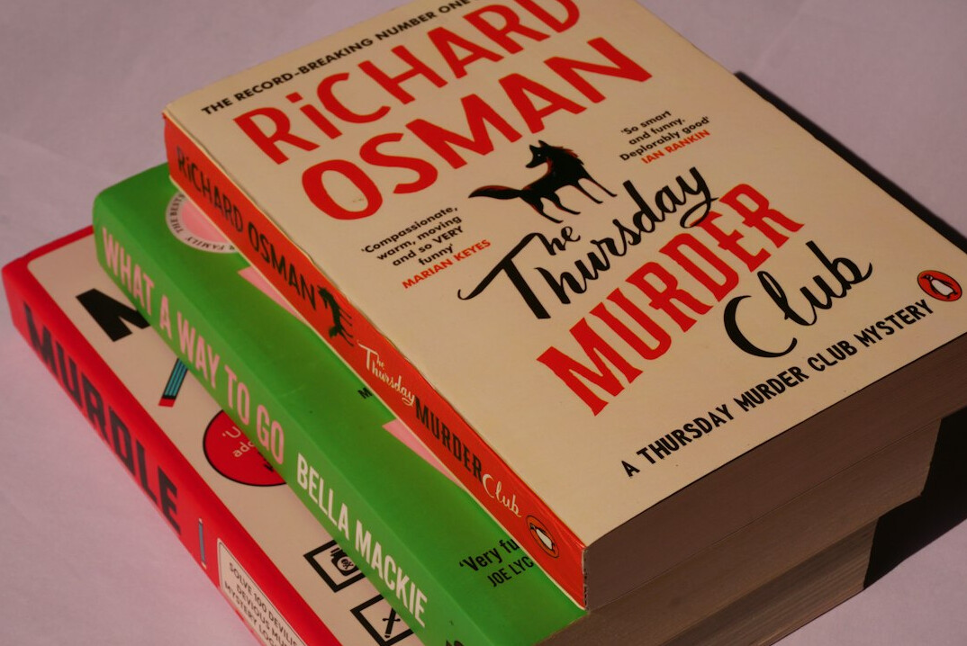 stack of old mystery novels
